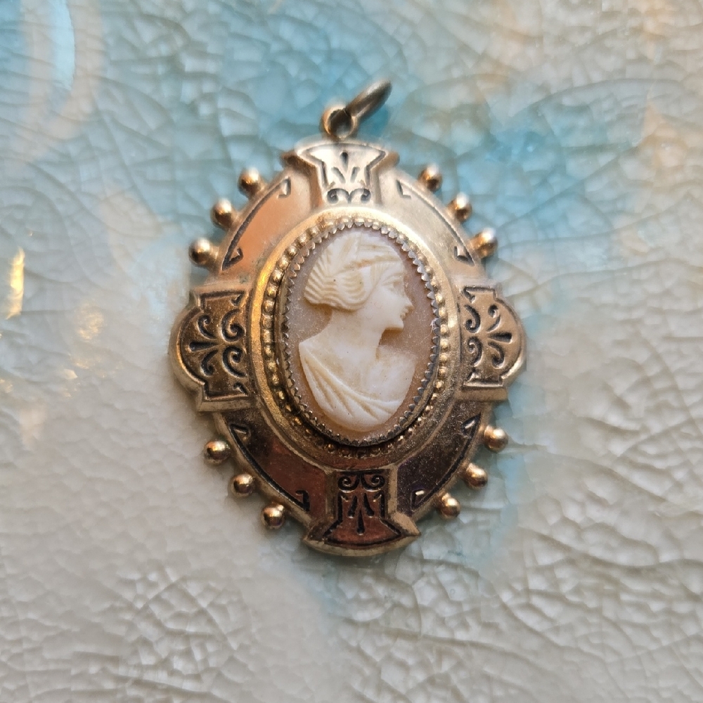 Elegant Gold Cameo Pendant